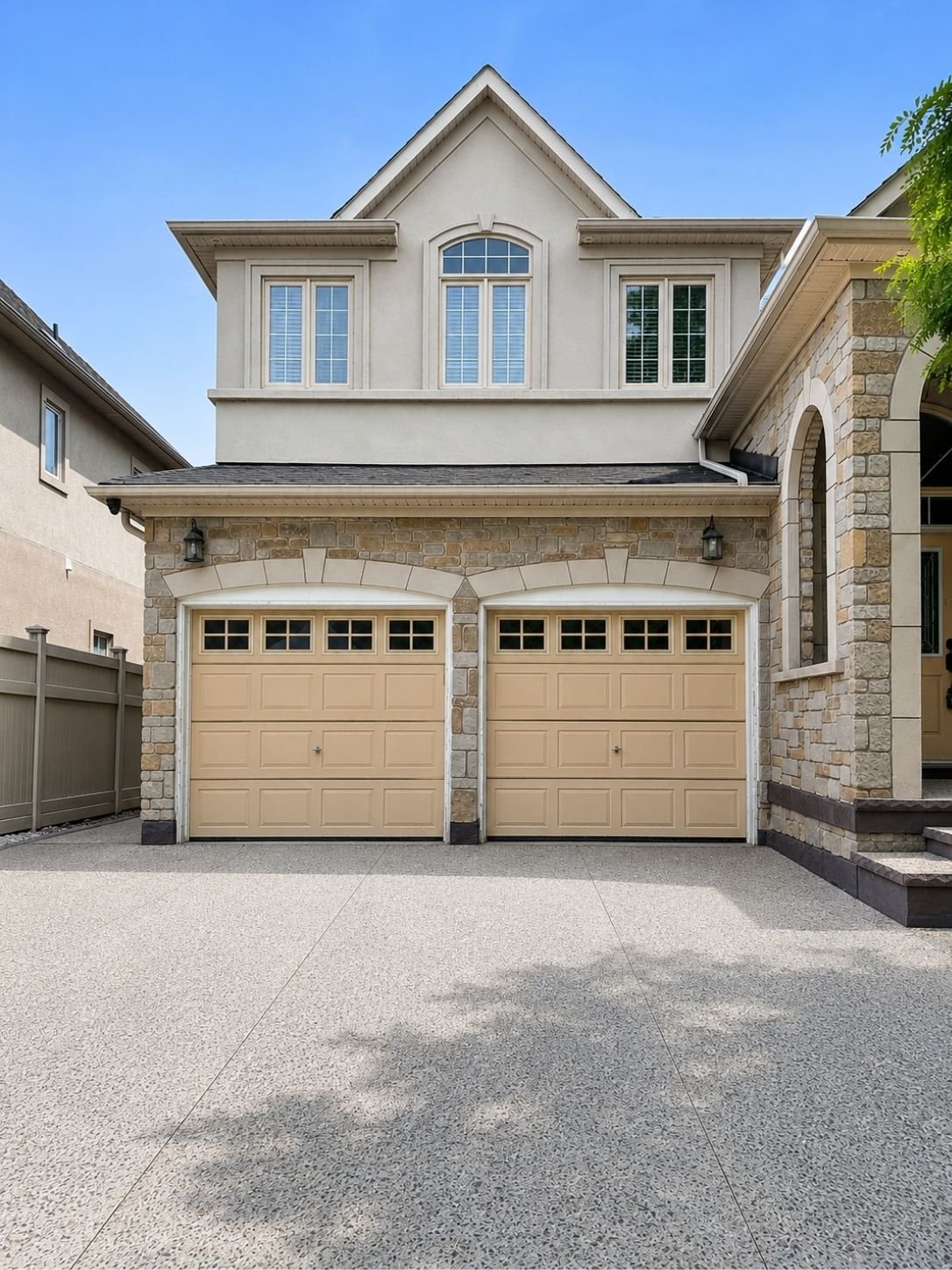 Before installation: two beige garage doors